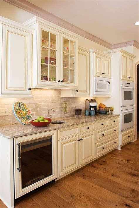 cream colored kitchen cabinets with stainless steel appliances|cream colored kitchen cabinets.